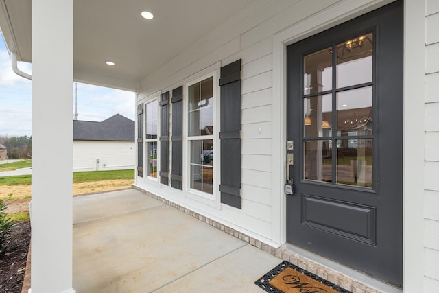 entrance to property with a porch