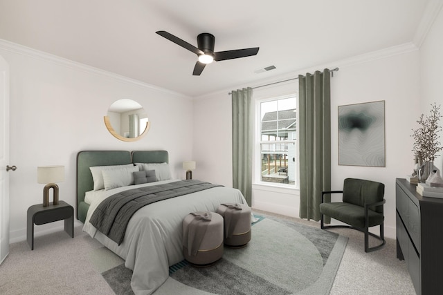 carpeted bedroom featuring ceiling fan and crown molding