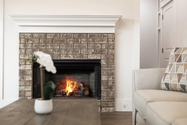 room details featuring a brick fireplace