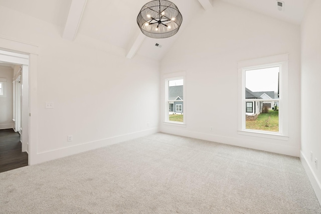 interior space with carpet, a notable chandelier, beam ceiling, and high vaulted ceiling