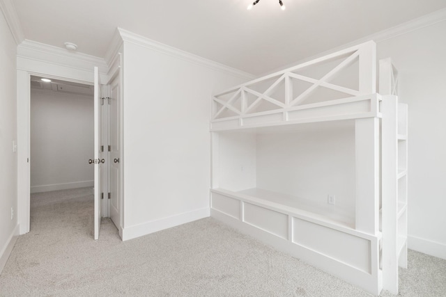 unfurnished bedroom with light carpet, a closet, and ornamental molding