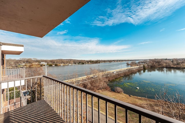 balcony featuring a water view