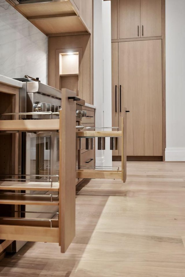 interior space with light hardwood / wood-style floors and wooden ceiling