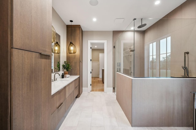 bathroom featuring vanity and a shower