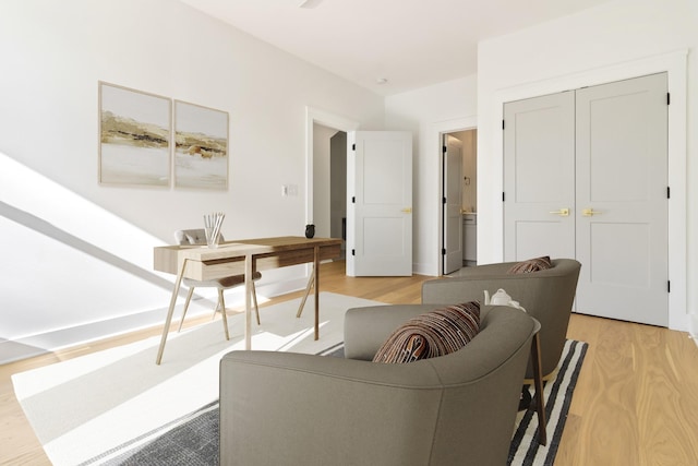 living room with light hardwood / wood-style flooring