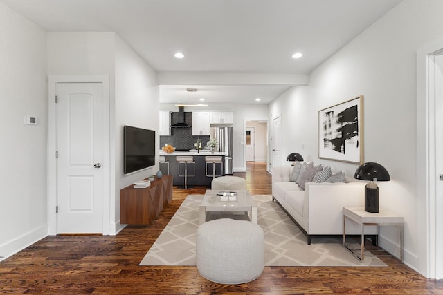 living room featuring dark wood-type flooring