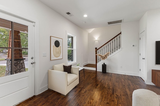 foyer entrance with dark wood-type flooring