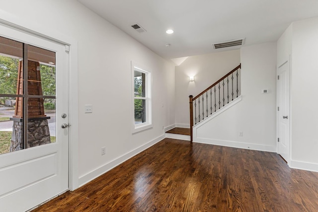 entrance foyer featuring dark hardwood / wood-style flooring