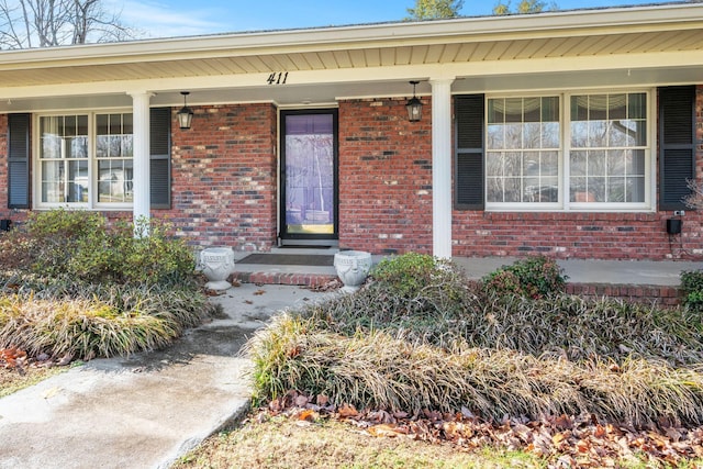 entrance to property with covered porch