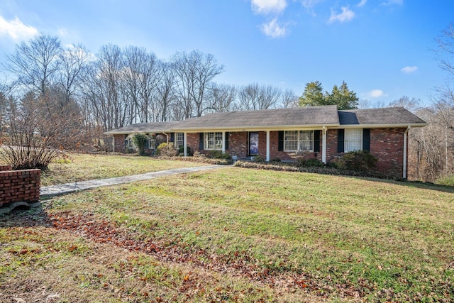 ranch-style home with a front yard