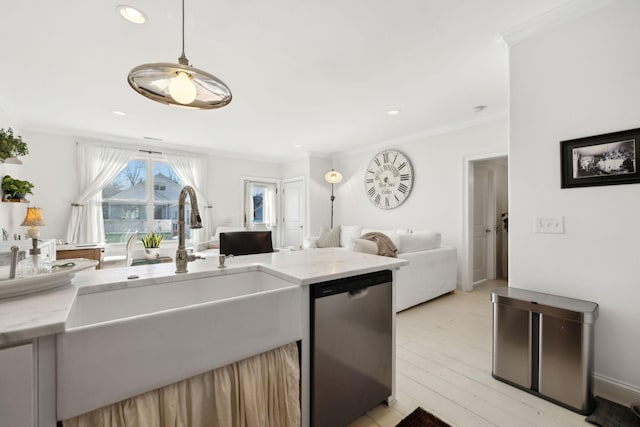 kitchen featuring stainless steel dishwasher, hanging light fixtures, ornamental molding, and light stone counters