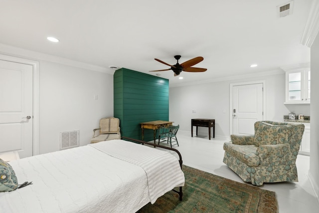 bedroom featuring ceiling fan and crown molding