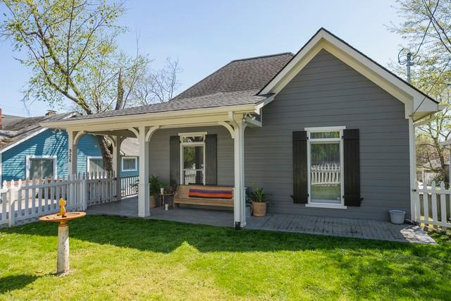 back of house featuring a yard