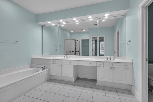 full bathroom with tile patterned flooring, vanity, toilet, and independent shower and bath