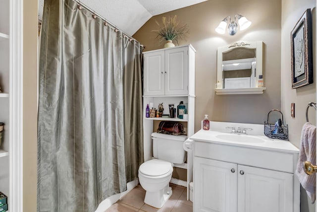 bathroom featuring a textured ceiling, vanity, vaulted ceiling, tile patterned flooring, and toilet