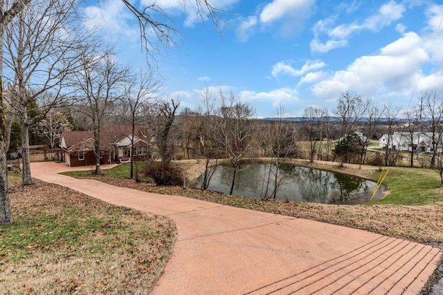 view of property's community with a water view