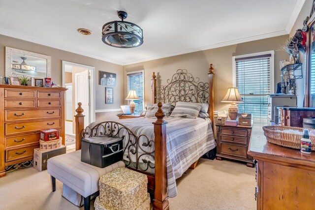 bedroom featuring light colored carpet, multiple windows, and ornamental molding