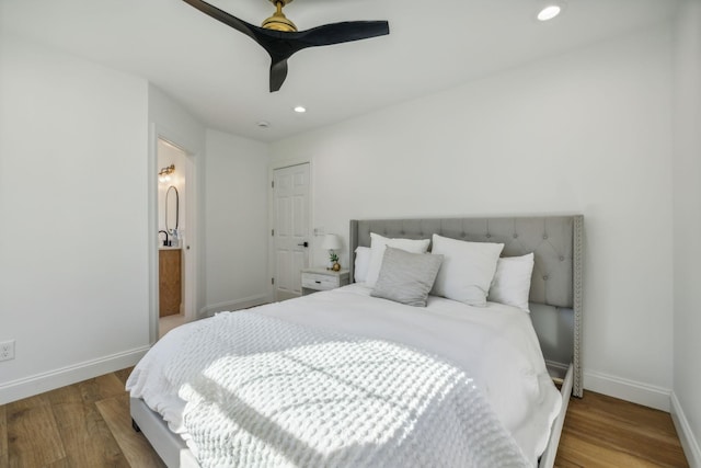 bedroom featuring hardwood / wood-style flooring and ceiling fan