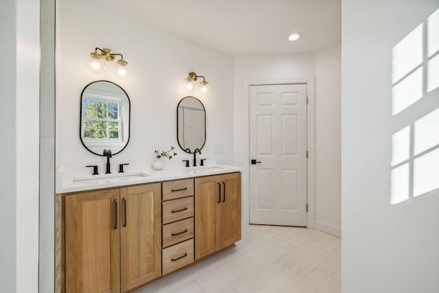 bathroom featuring tile patterned floors and vanity