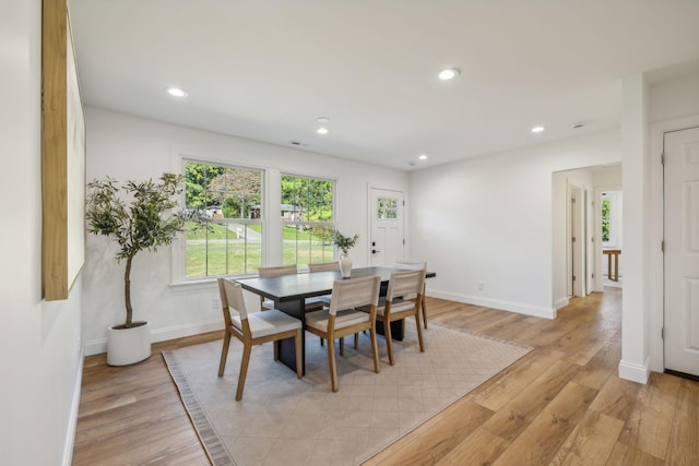 dining room featuring light hardwood / wood-style flooring