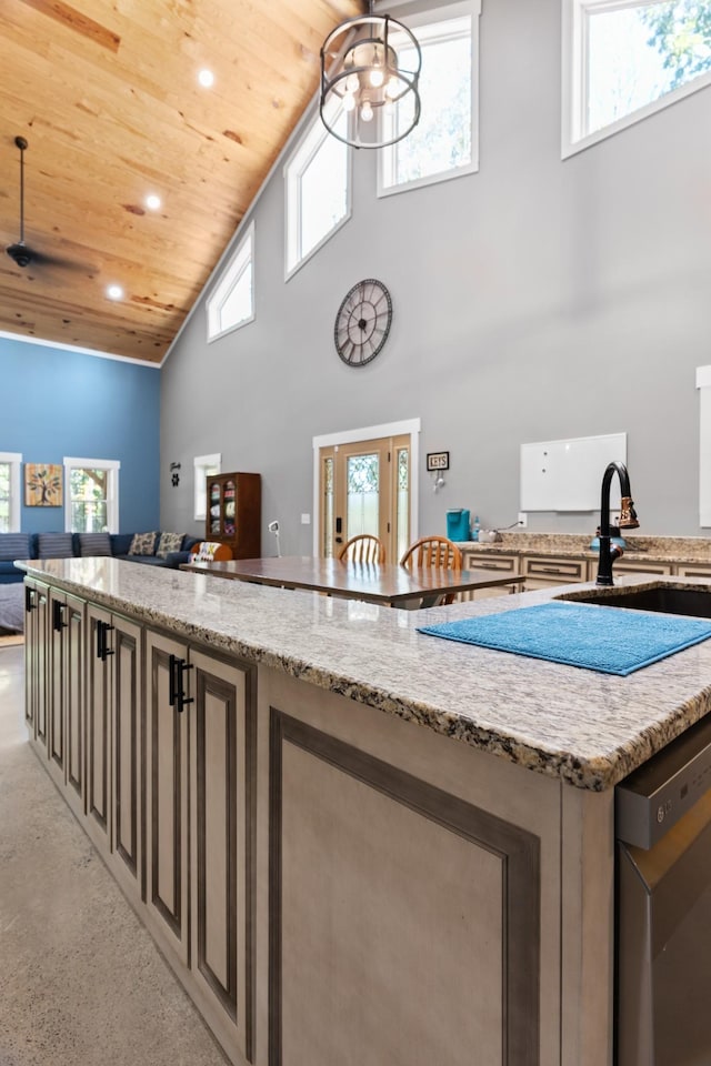 kitchen featuring sink, wooden ceiling, light stone counters, high vaulted ceiling, and dishwashing machine