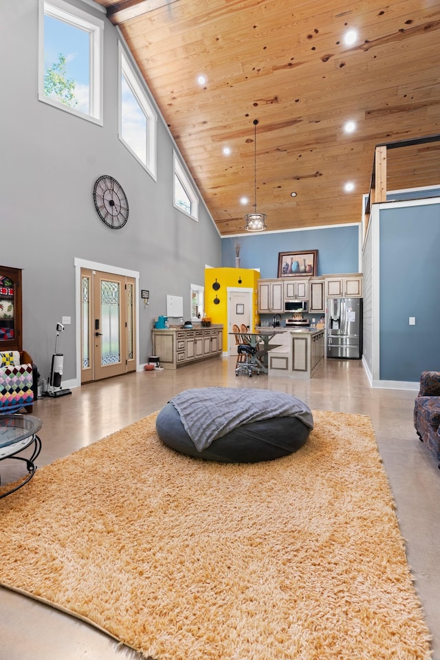 living room with high vaulted ceiling and wooden ceiling