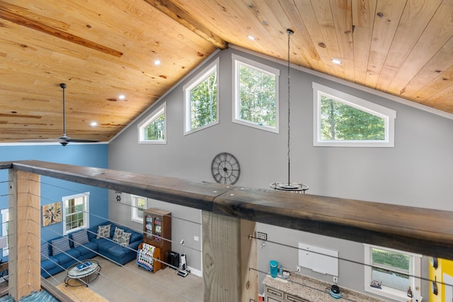 details featuring beamed ceiling, ceiling fan, and wood ceiling