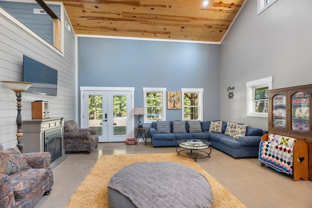 living room featuring french doors, high vaulted ceiling, a wealth of natural light, and wooden ceiling