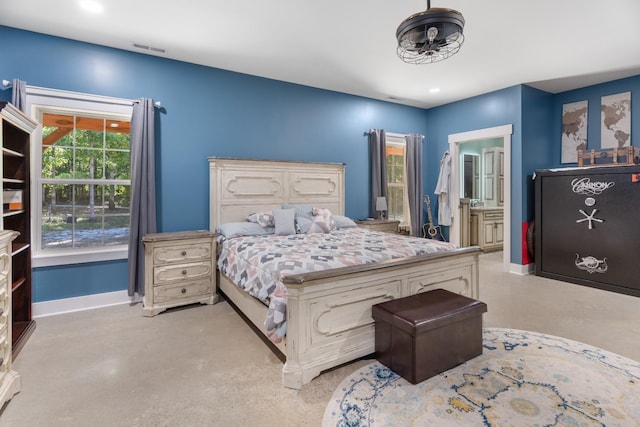 bedroom featuring ensuite bathroom