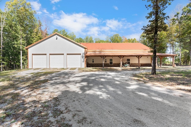 ranch-style home featuring a garage