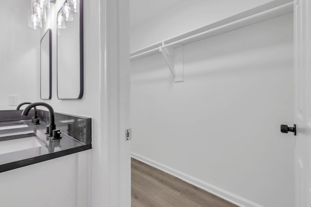 bathroom featuring hardwood / wood-style floors and sink