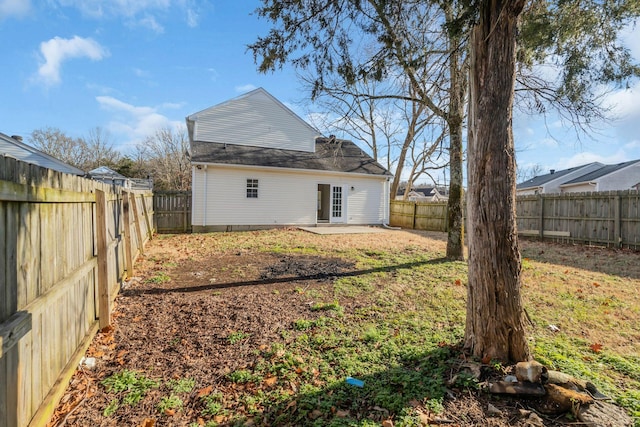 back of house with a patio area