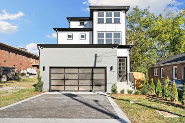 modern home featuring a garage