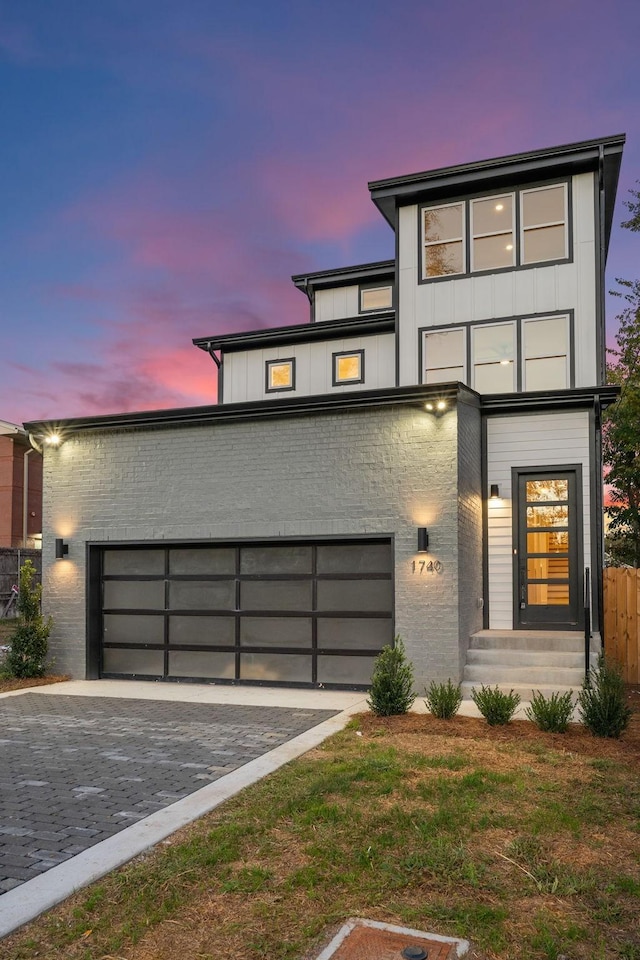 modern home featuring a garage