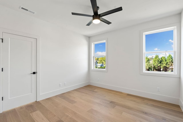 unfurnished room featuring ceiling fan and light hardwood / wood-style flooring