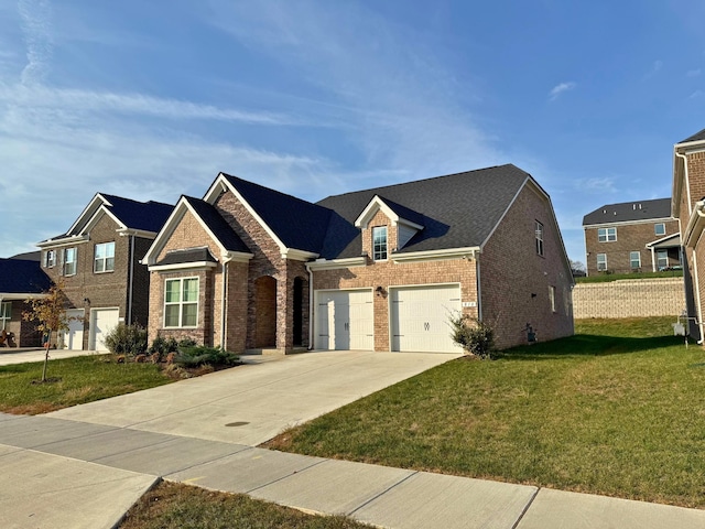 view of front of property featuring a garage and a front lawn