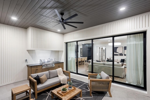 carpeted living room featuring ceiling fan and wood ceiling