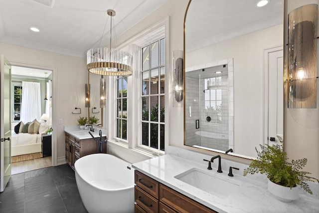 bathroom featuring tile patterned flooring, separate shower and tub, a chandelier, vanity, and ornamental molding