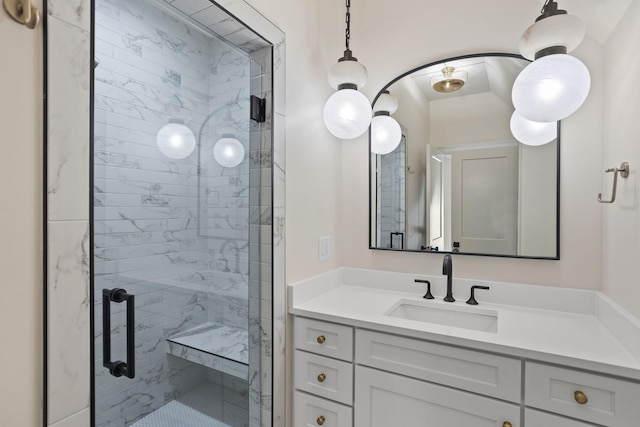 bathroom with vanity and an enclosed shower