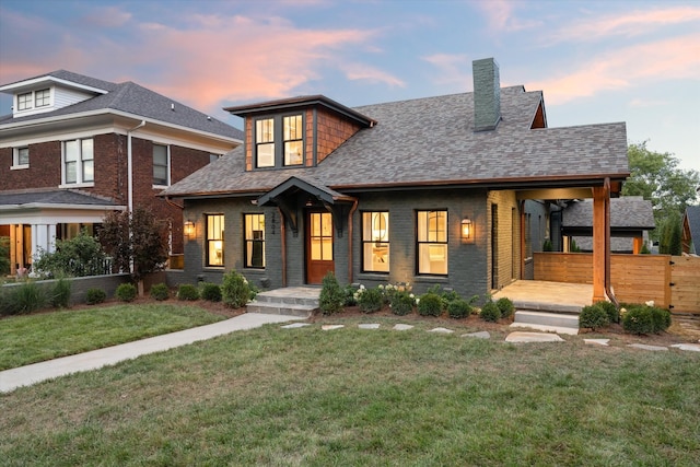 view of front of house with a lawn