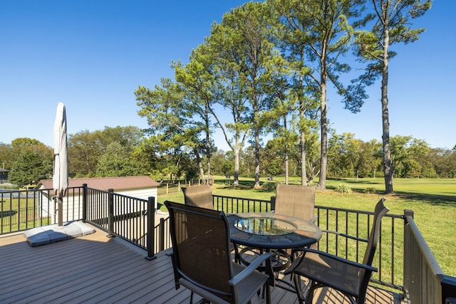 deck featuring a yard