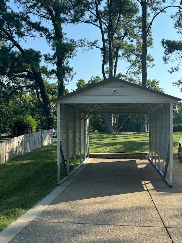 view of vehicle parking with a lawn and a carport