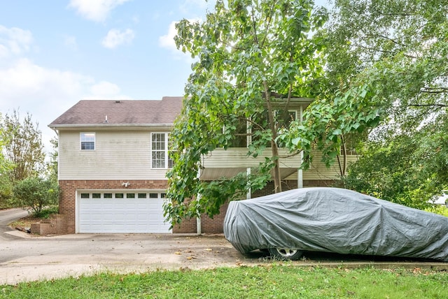 exterior space with a garage