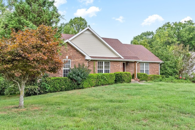 view of front of house with a front lawn