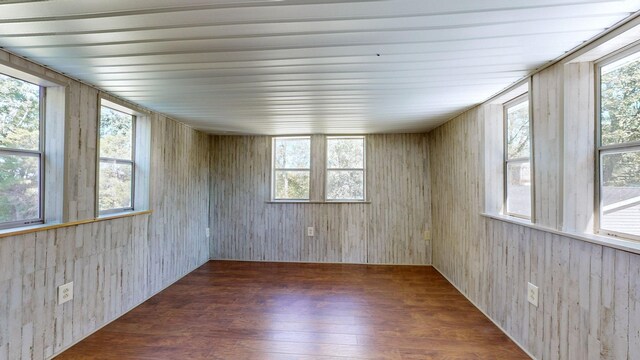 spare room featuring dark hardwood / wood-style flooring