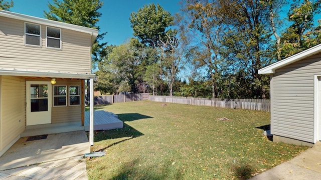 view of yard with a wooden deck