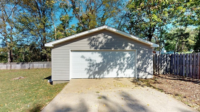 garage with a lawn