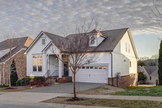 view of front of property featuring a garage