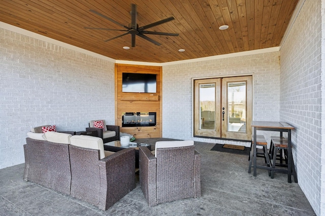 view of patio / terrace featuring outdoor lounge area, ceiling fan, and french doors