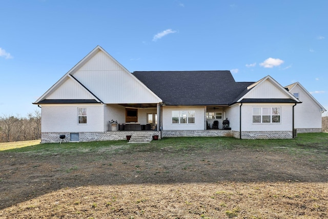 view of front of home with a front yard